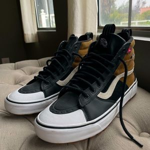Vans Sk8 hi mte size 10 Black and Tan. Selling because they are 1 size too big.